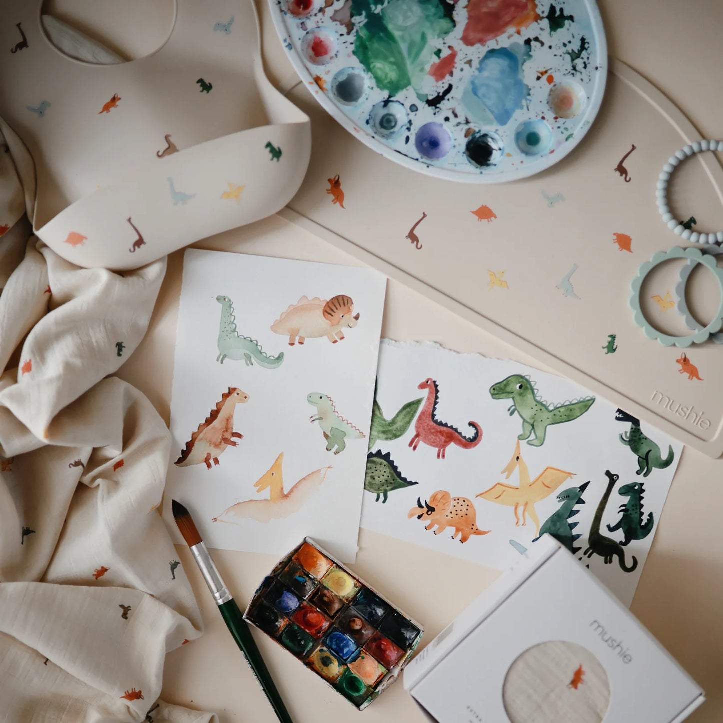 Mushie Organic Muslin Swaddle - Dinosaurs - Little Reef and Friends